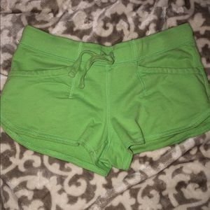 Green booty shorts.